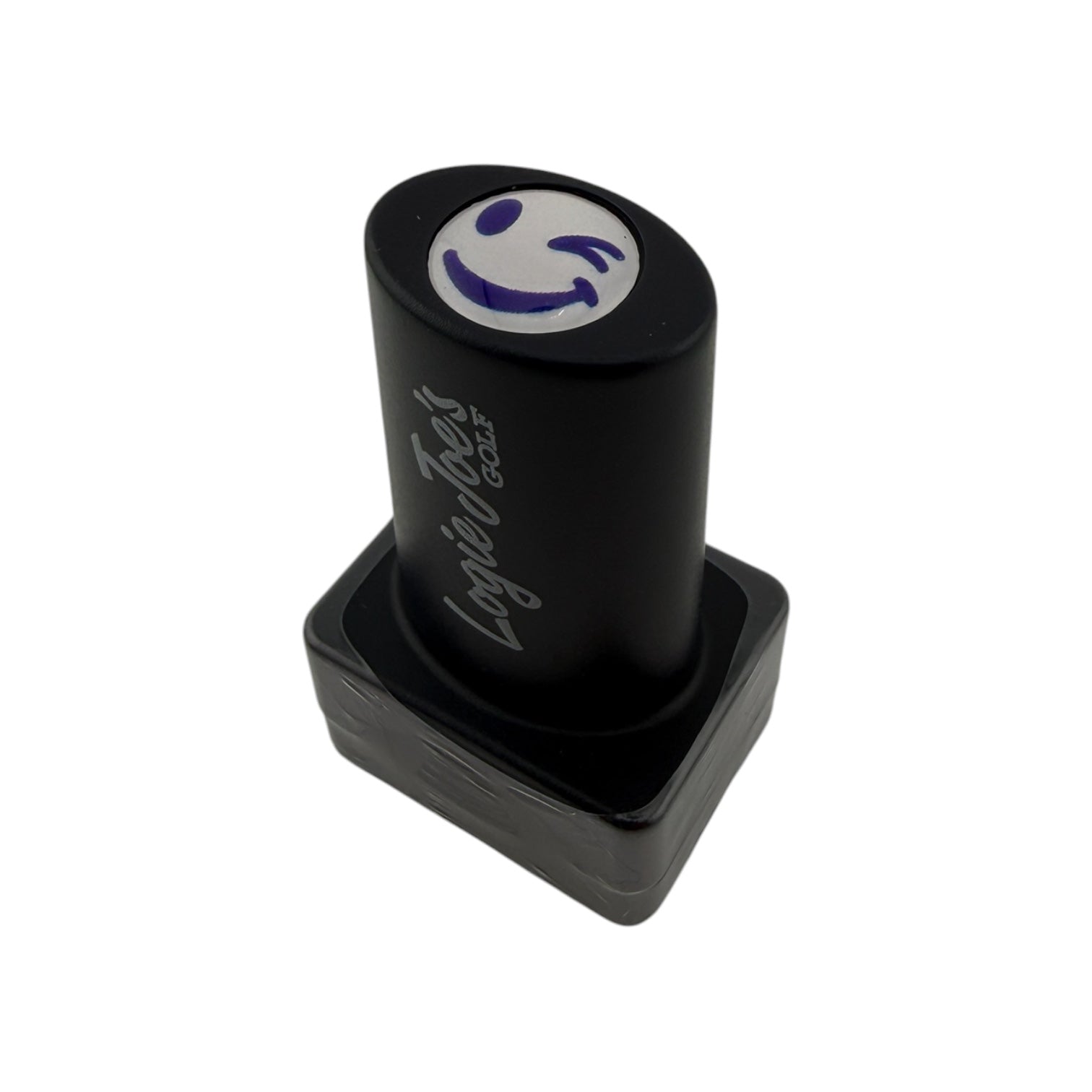 The Winky Face Golf Ball Stamp features quick-dry ink, easy ball identification, and a purple smiley face design—making it a fun golf gift, shown here with "Loyalty Test" on the black self-inking stamper against a white background.
