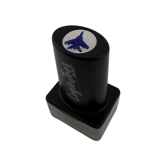 The Jet Blue Golf Ball Stamp features a black rectangular body with “Logic Tees Golf” on the side and a blue jet airplane graphic on top, making it perfect for personalizing your golf accessories and quickly identifying your ball.