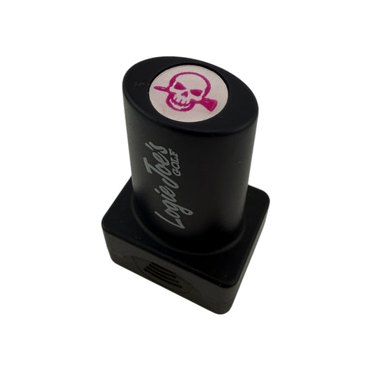 The Skull Ball Stamp features quick-dry ink, a pink skull and crossbones design, and helps easily identify your golf balls—perfect for adding unique flair to your personalized golf accessories or as a fun golf gift.