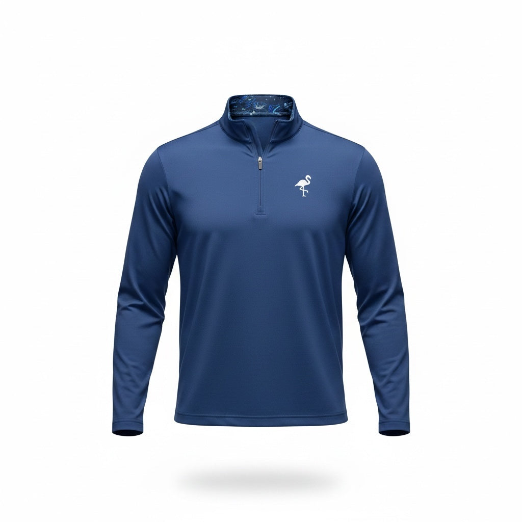 The Unisex Marble Wave Performance Quarter Zip is a long-sleeve, blue pullover with a small white flamingo logo, made from lightweight moisture-wicking fabric. It features a patterned blue collar lining and is displayed on a plain white background.