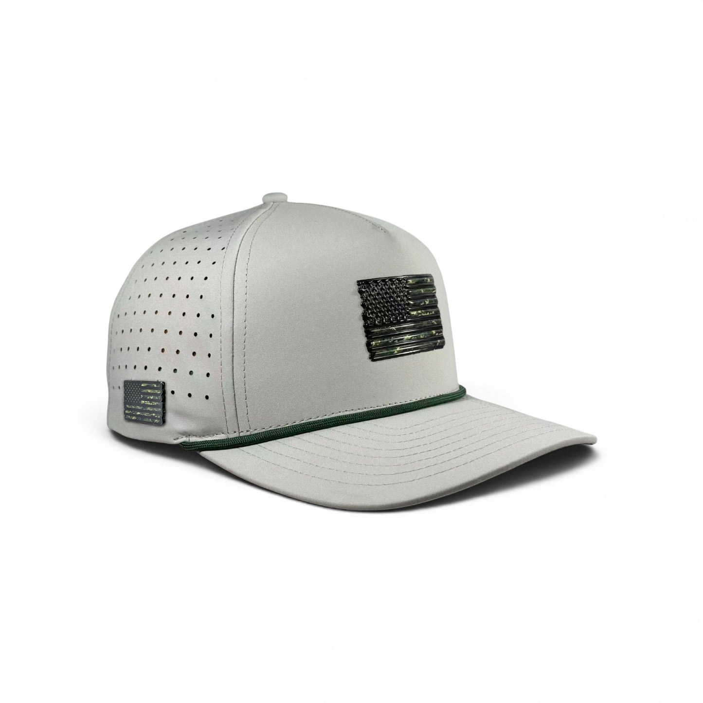 The Tactical Golf Hat is a light gray, adjustable snapback cap with ventilated side panels, an American flag patch, green accent above the brim, side patch, and a built-in magnetic ball marker holder plus included marker in American camo style.