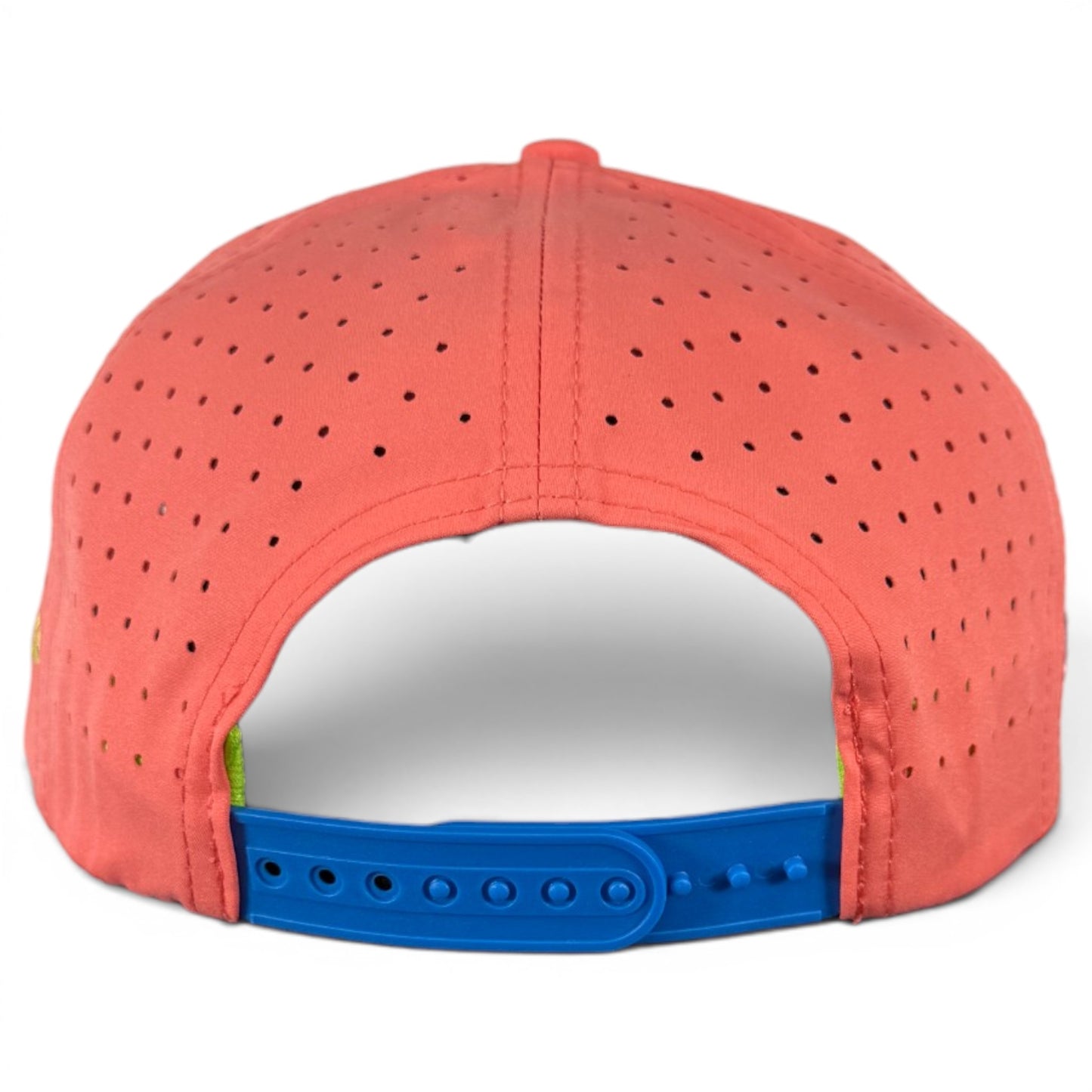 The image shows the back view of the Tree Frog Golf Hat | Snapback Cap in coral pink with small ventilation holes, a blue adjustable snapback strap, and a built-in magnetic ball marker holder—ideal for any golf fan.